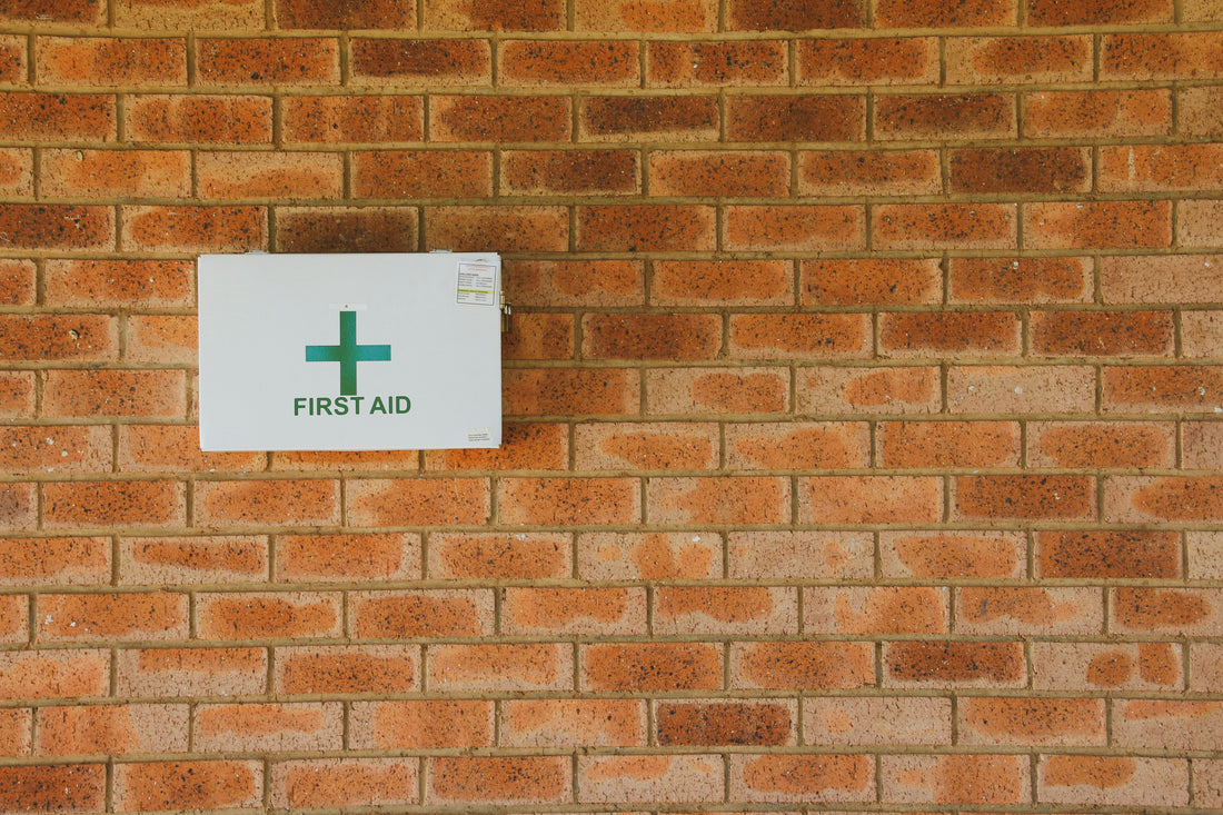First aid supplies laid out for a caregiver of an aging parent