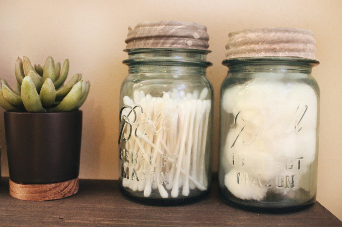 Cotton swabs and cotton balls, representing everyday first aid kit supplies