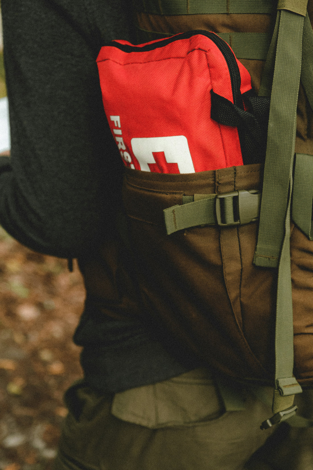 Compact travel first aid kit packed for sports, gym, and outdoor use